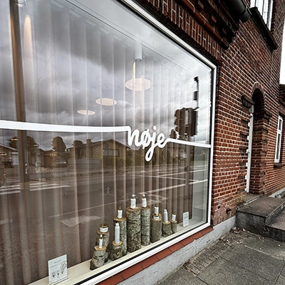 Picture of window with store logo